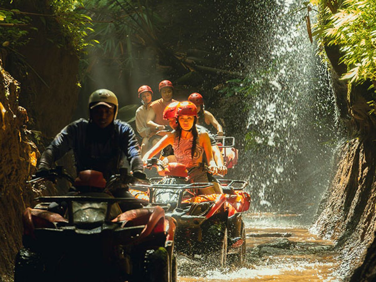 Ubud ATV Quad bike through river jungle waterfall rice fields