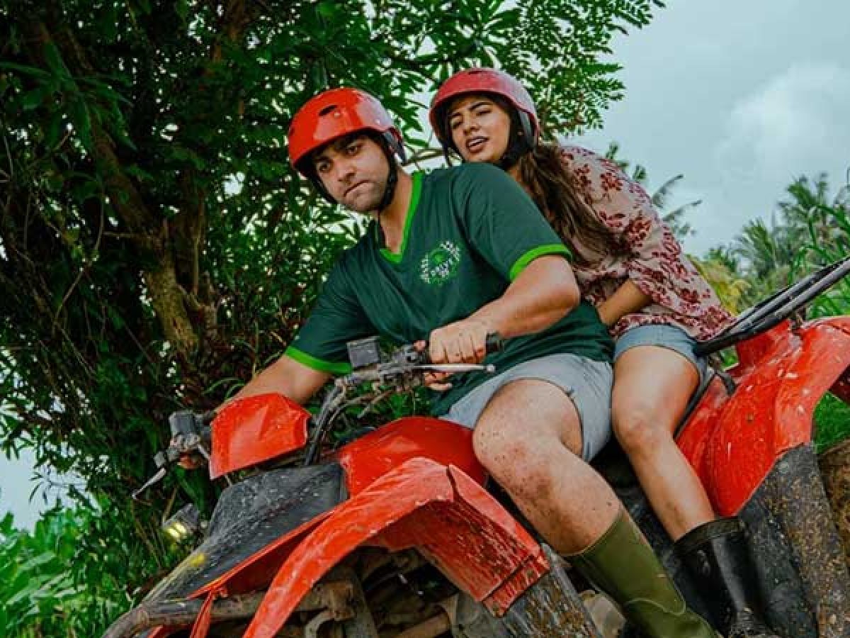 Ubud ATV Quad bike through river jungle waterfall rice fields
